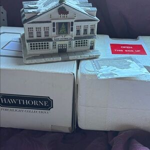 “ Rockwell’s studio” by Norman Rockwell Hawthorne Village Christmas collection.